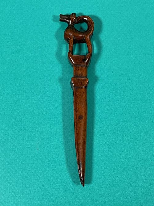 a rare antique treen apple corer with a carved dog - CATEGORY: ANTIQUE MISCELLANEOUS - DATED 18TH CENTURY