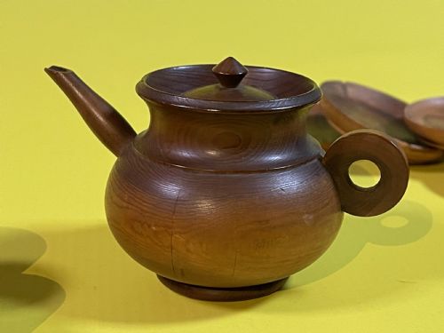 AN ANTIQUE CEDAR WOOD MINIATURE TEA SET - ADDITIONAL PHOTO 1