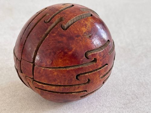 an antique treen puzzle ball - CATEGORY: ANTIQUE MISCELLANEOUS - DATED EDWARDIAN