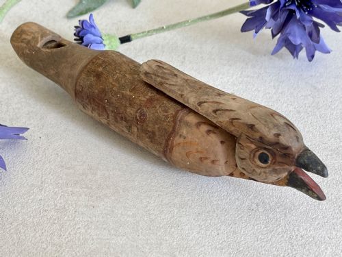 an antique treen painted bird callwhistle - CATEGORY: ANTIQUE MISCELLANEOUS - DATED 19TH CENTURY