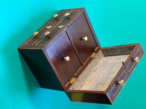 AN ANTIQUE TEA CADDY IN THE SHAPE OF A CHEST OF DRAWERS - ADDITIONAL PHOTO 1
