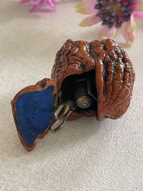 AN ANTIQUE WALNUT WITH SEWING TOOLS - ADDITIONAL PHOTO 2