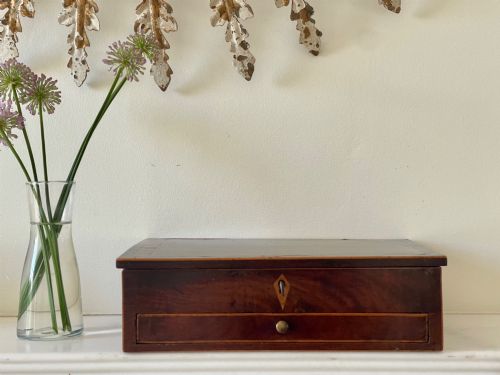 A Georgian Flame Mahogany Jewellery Box