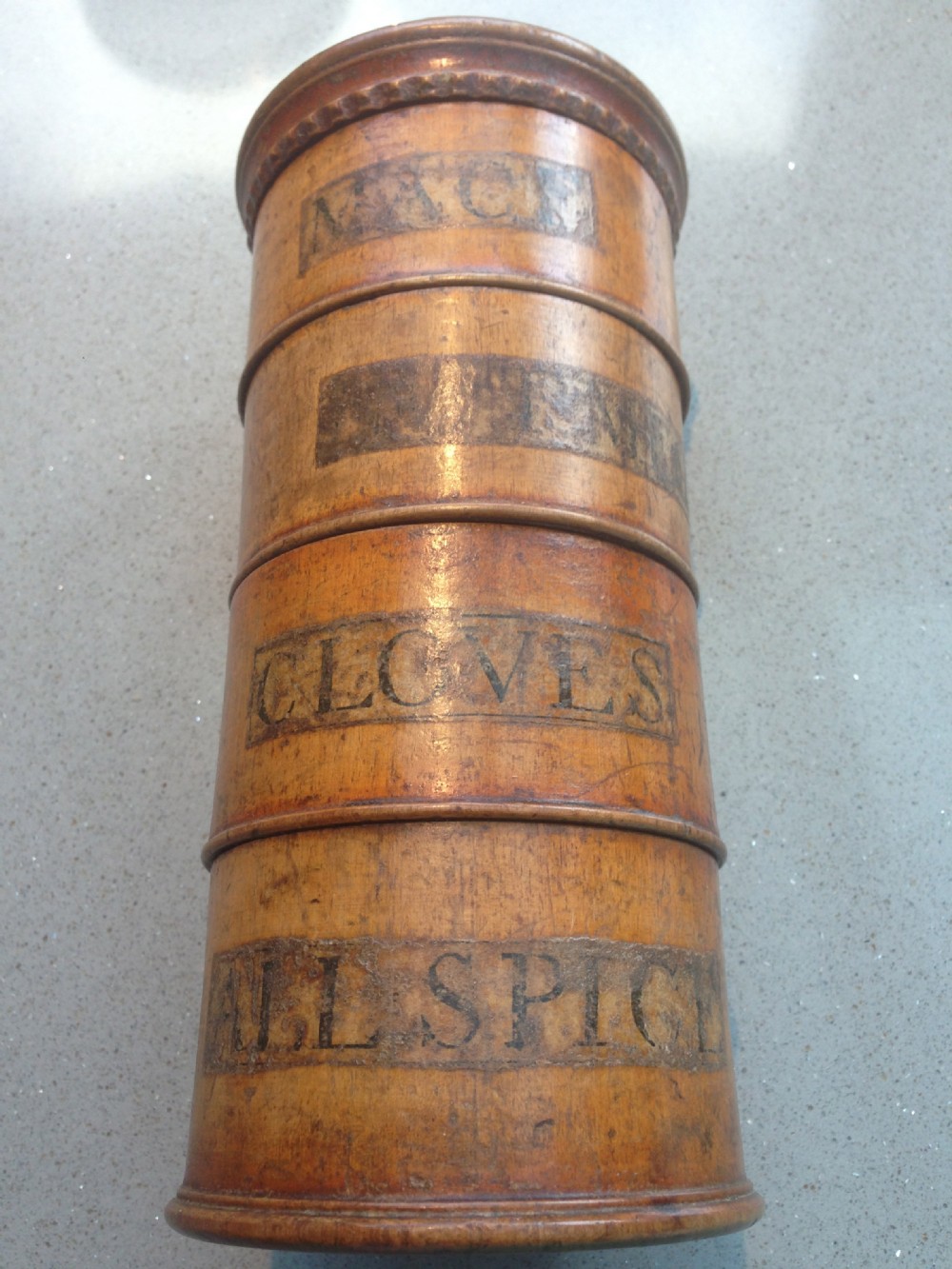 An antique four tier spice tower