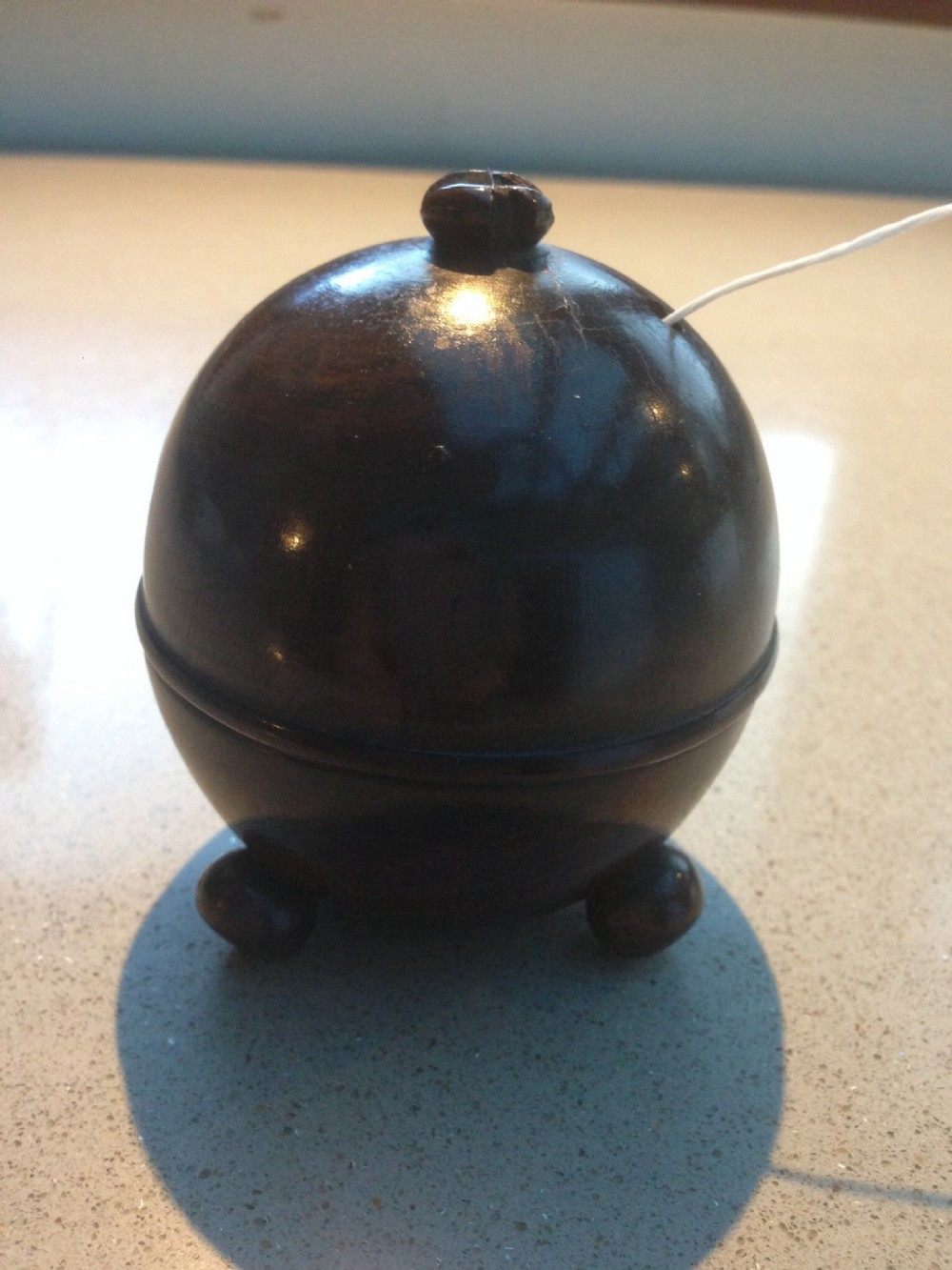 An antique lignum vitae string box