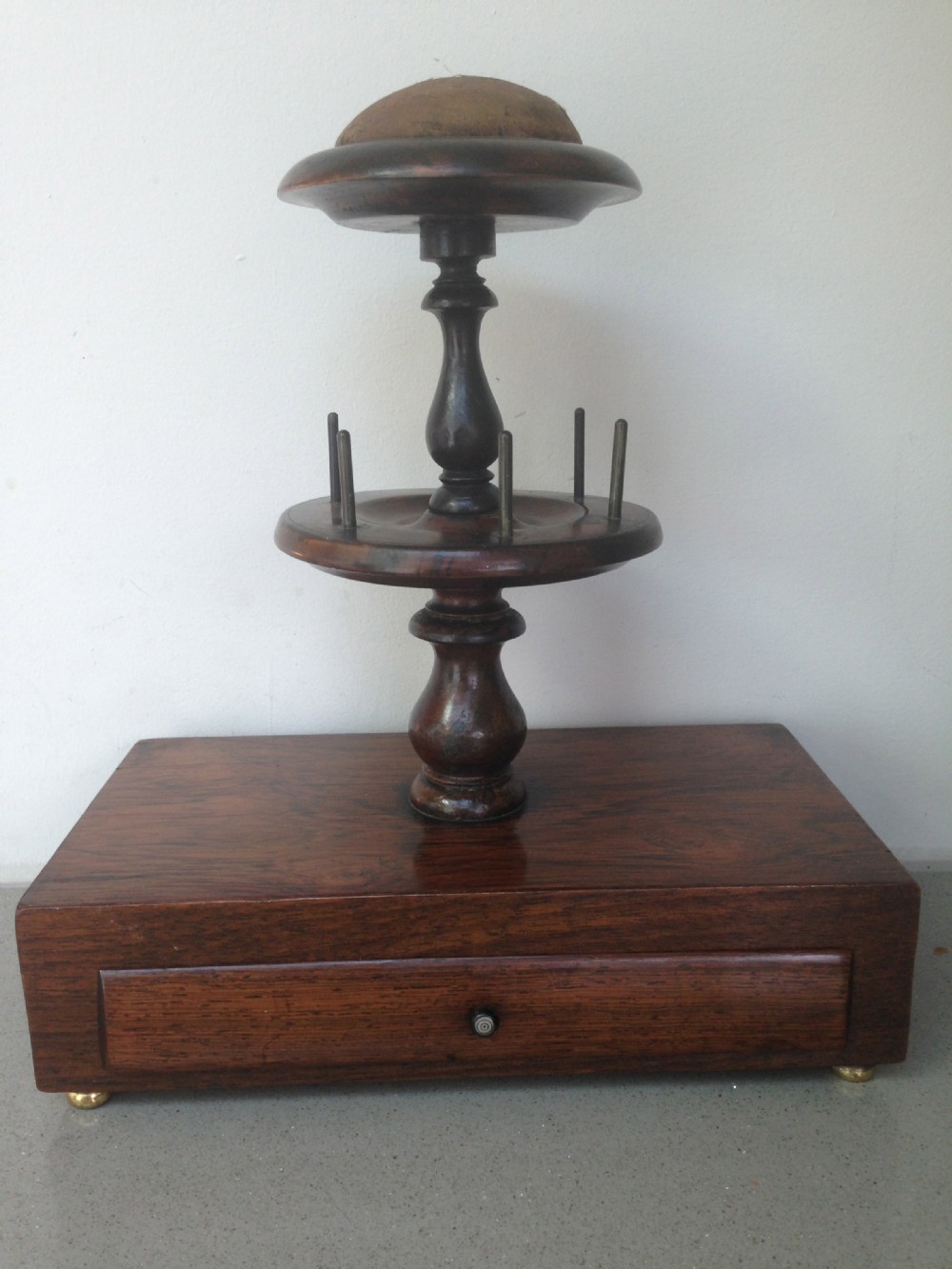 A 19th century Revolving sewing companion