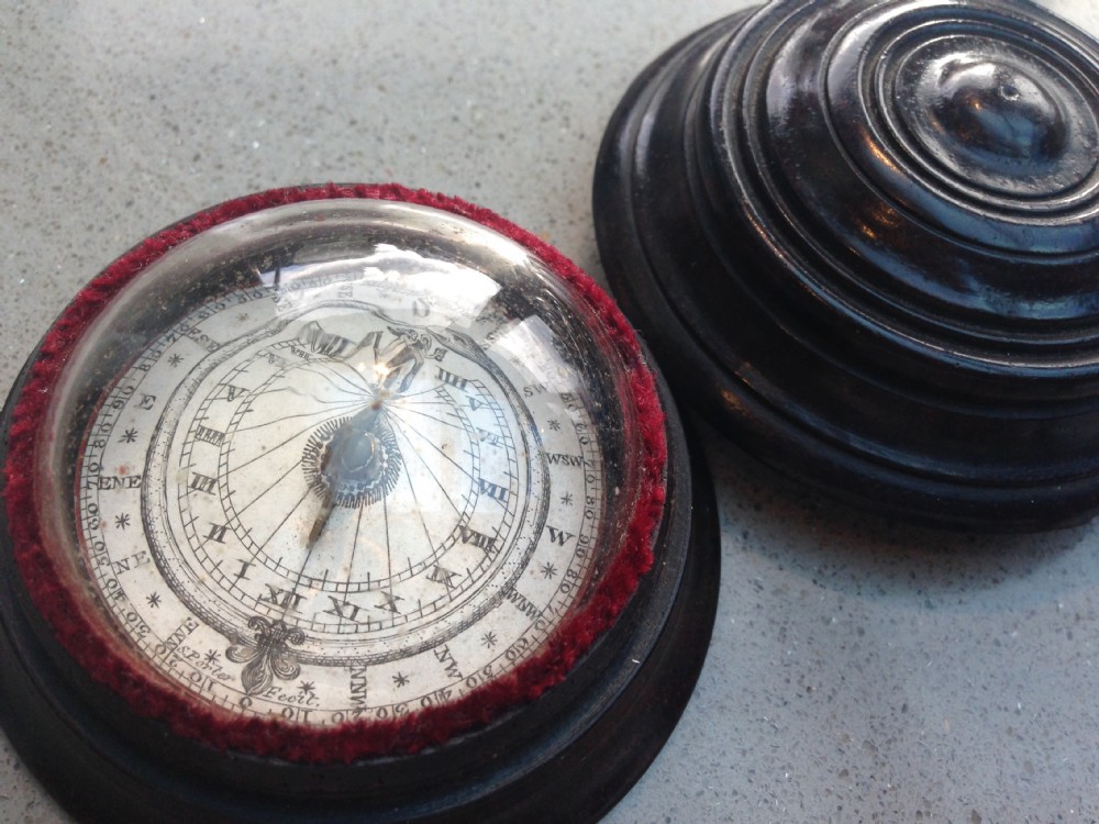 An early 19th century floating sundial and compass as seen in the National Maritime Museum