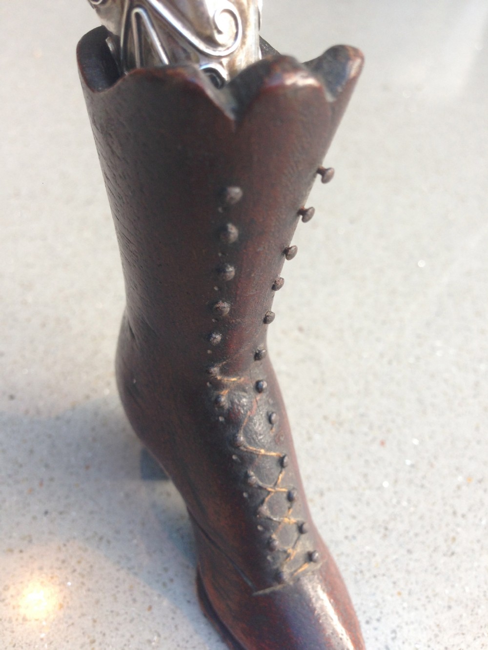 A 19th century treen boot for holding a thimble