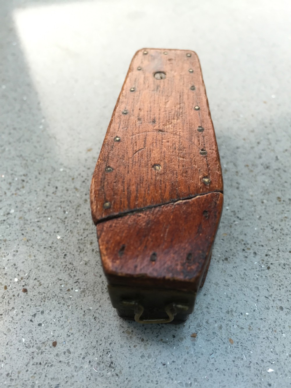 Antique coffin snuff box with carved man
