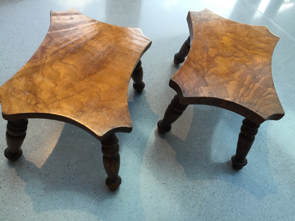 A pair of antique dresser/candle stools