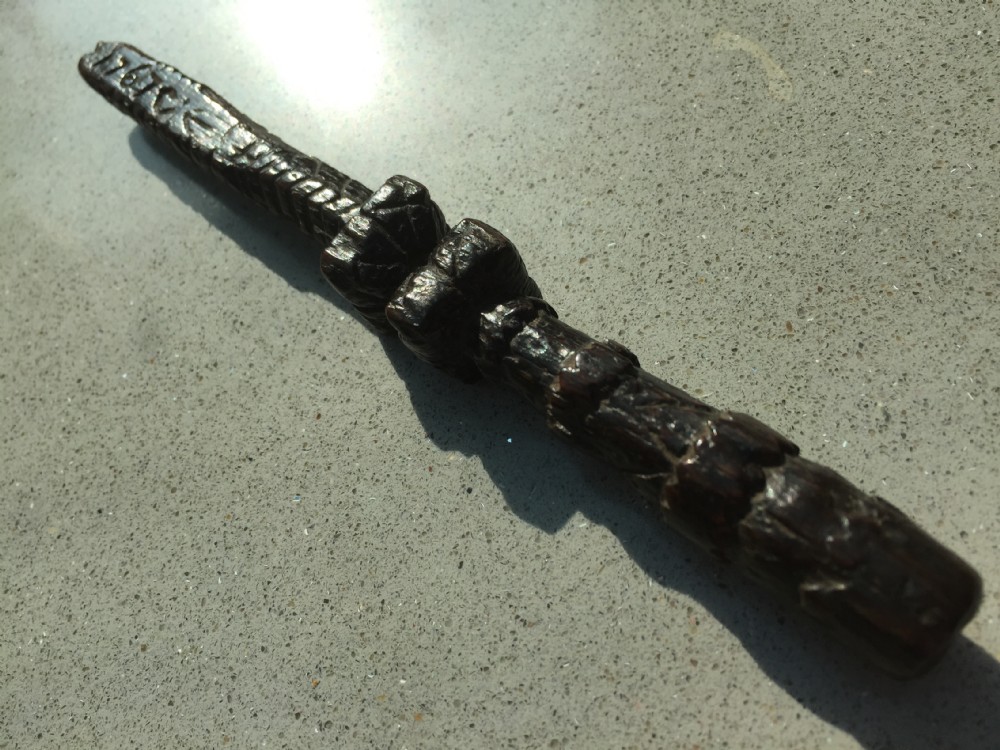 A dated antique treen knitting sheath
