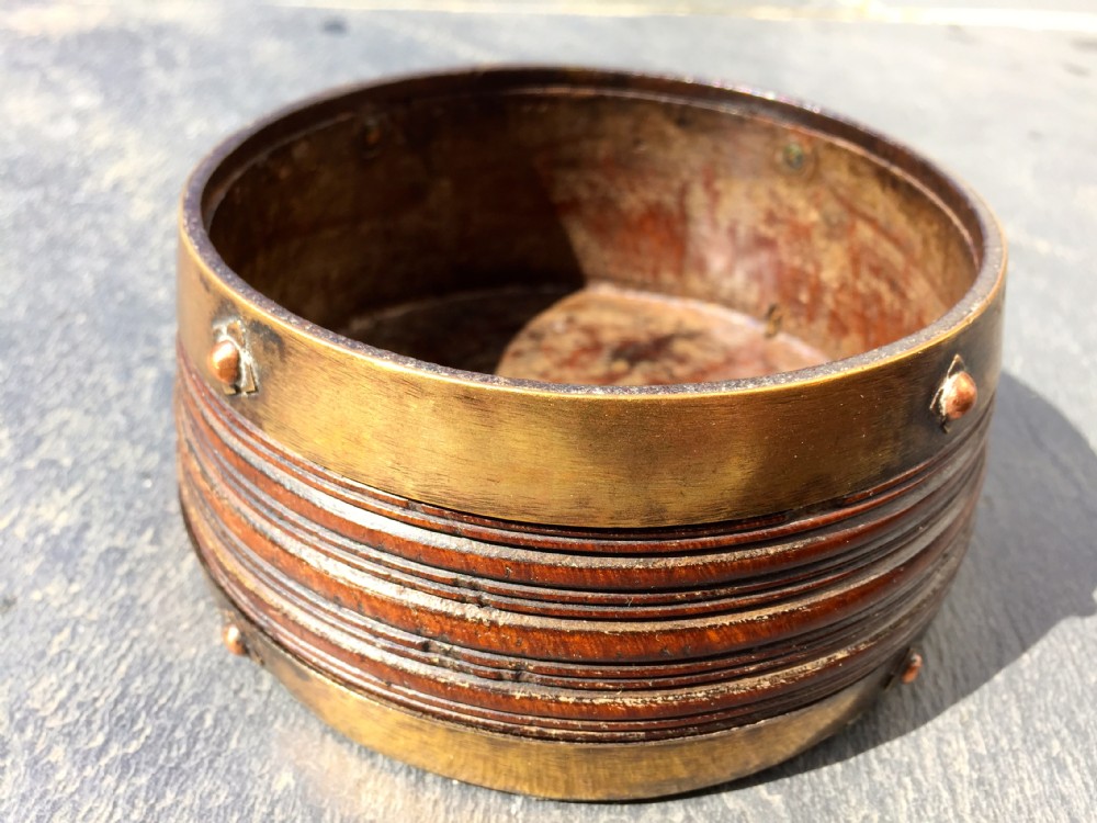 A Lignum Vitae Brass Bound Wine Coaster