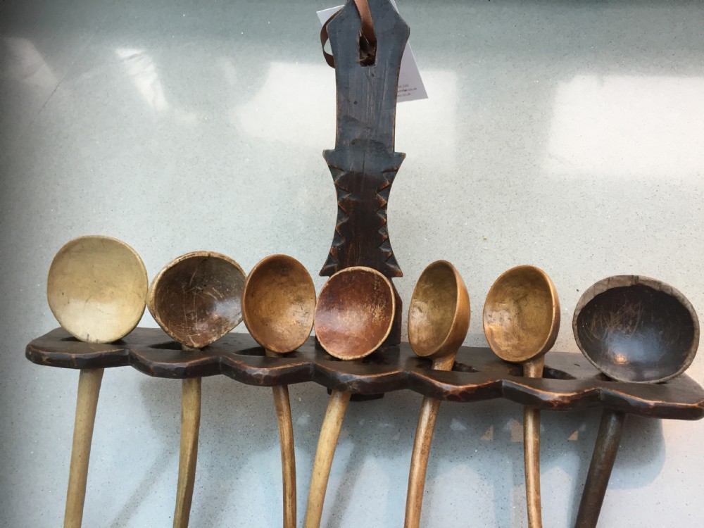 An early 19th century antique spoon rack