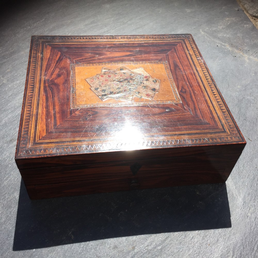 An antique inlaid card box