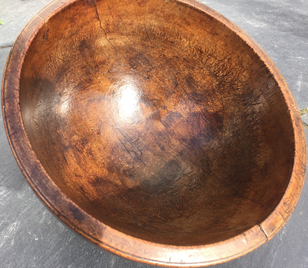 A lovely deep 19th century sycamore dairy bowl