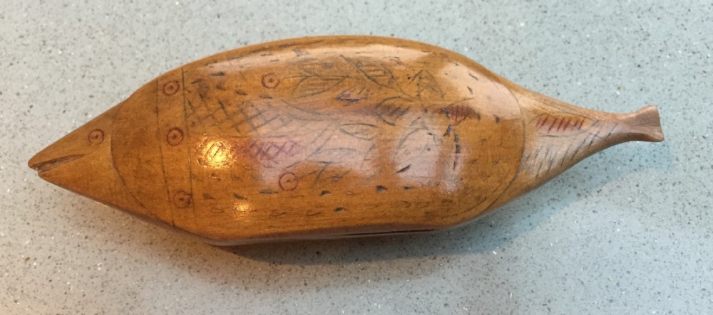 An antique snuff box in the form of a fish