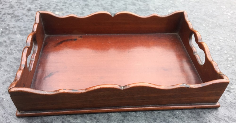 A small mahogany visiting card tray