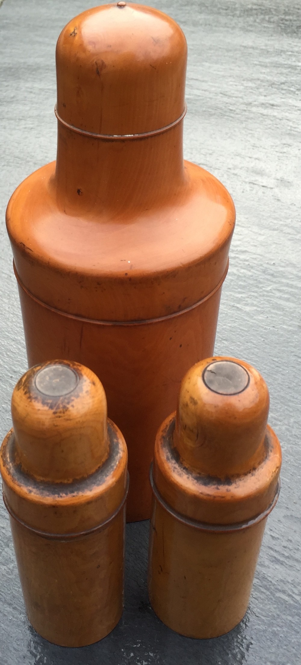 Three Victorian boxwood apothecary cases, two with bottles