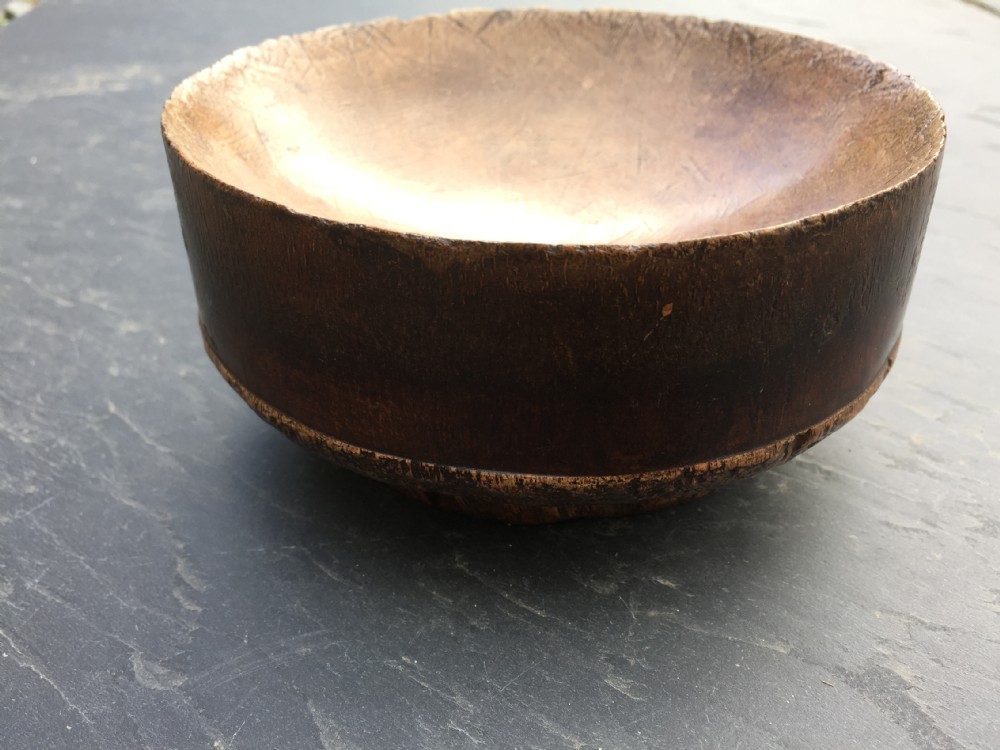 A rare early 18th century log bowl