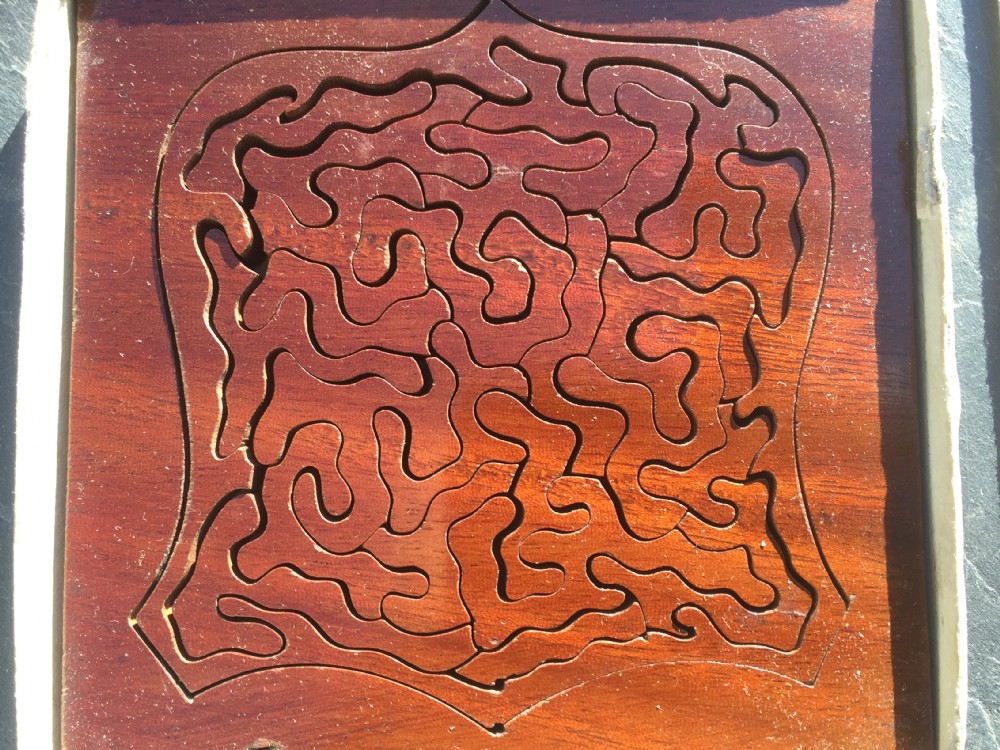An Antique Mahogany Puzzle