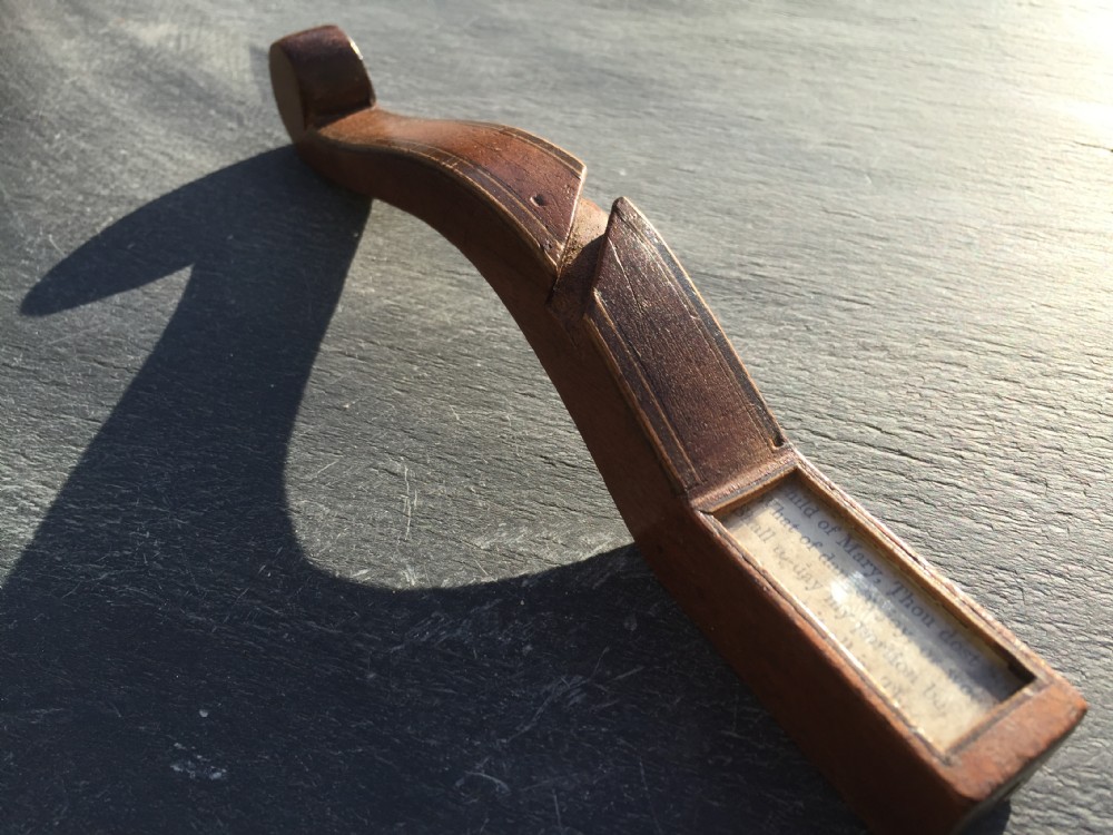 A 19th century treen knitting sheath with verse