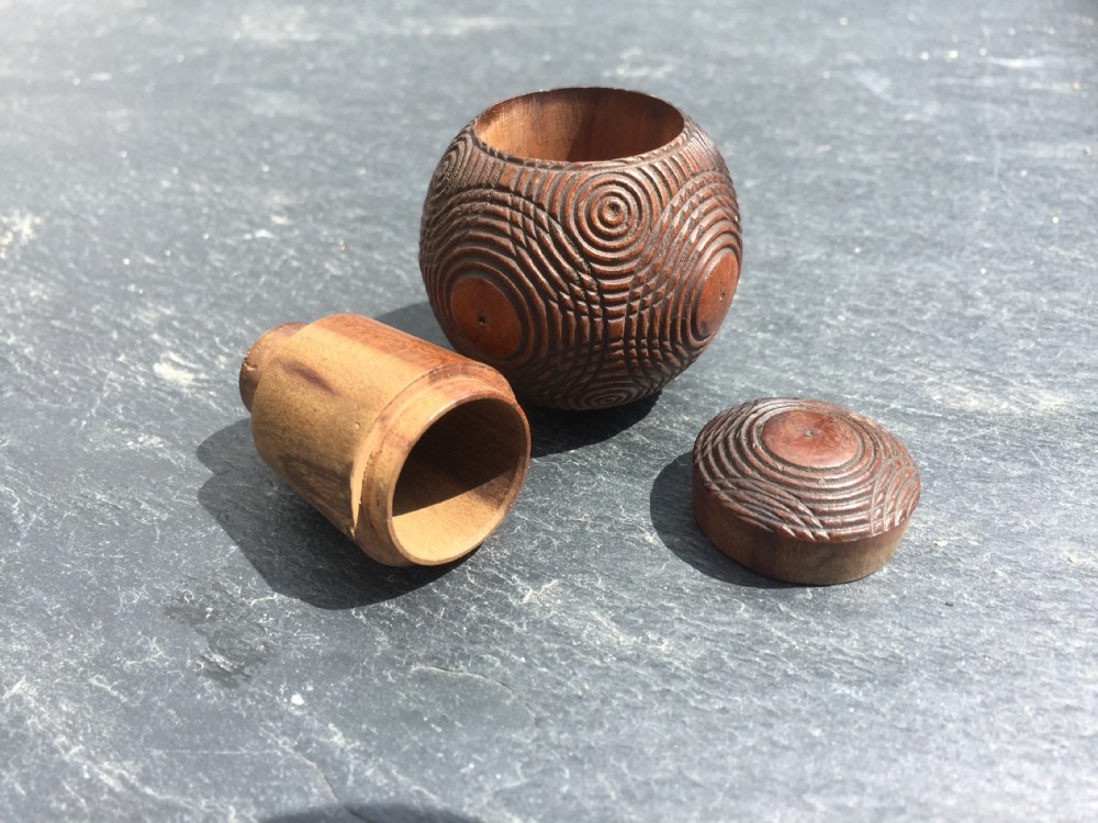 An antique treen puzzle ball 