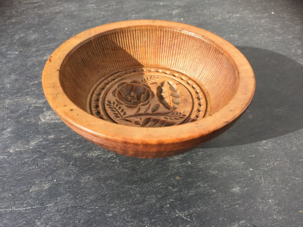 An early 19th century sycamore flummery mould