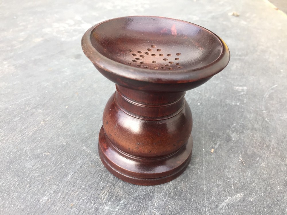 An early 19th century fruitwood pounce pot 