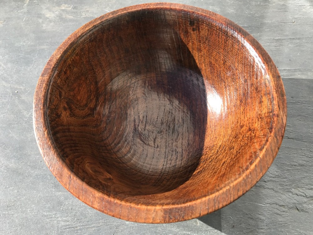 A 19th century treen elm food bowl