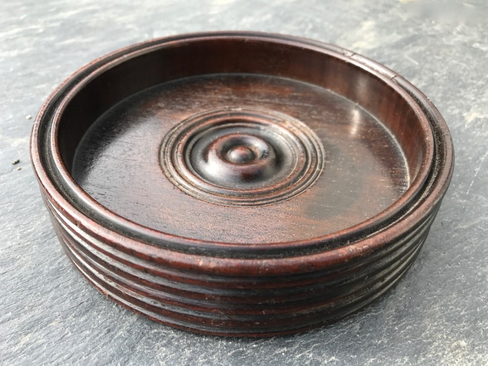 An  Irish antique mahogany wine coaster 
