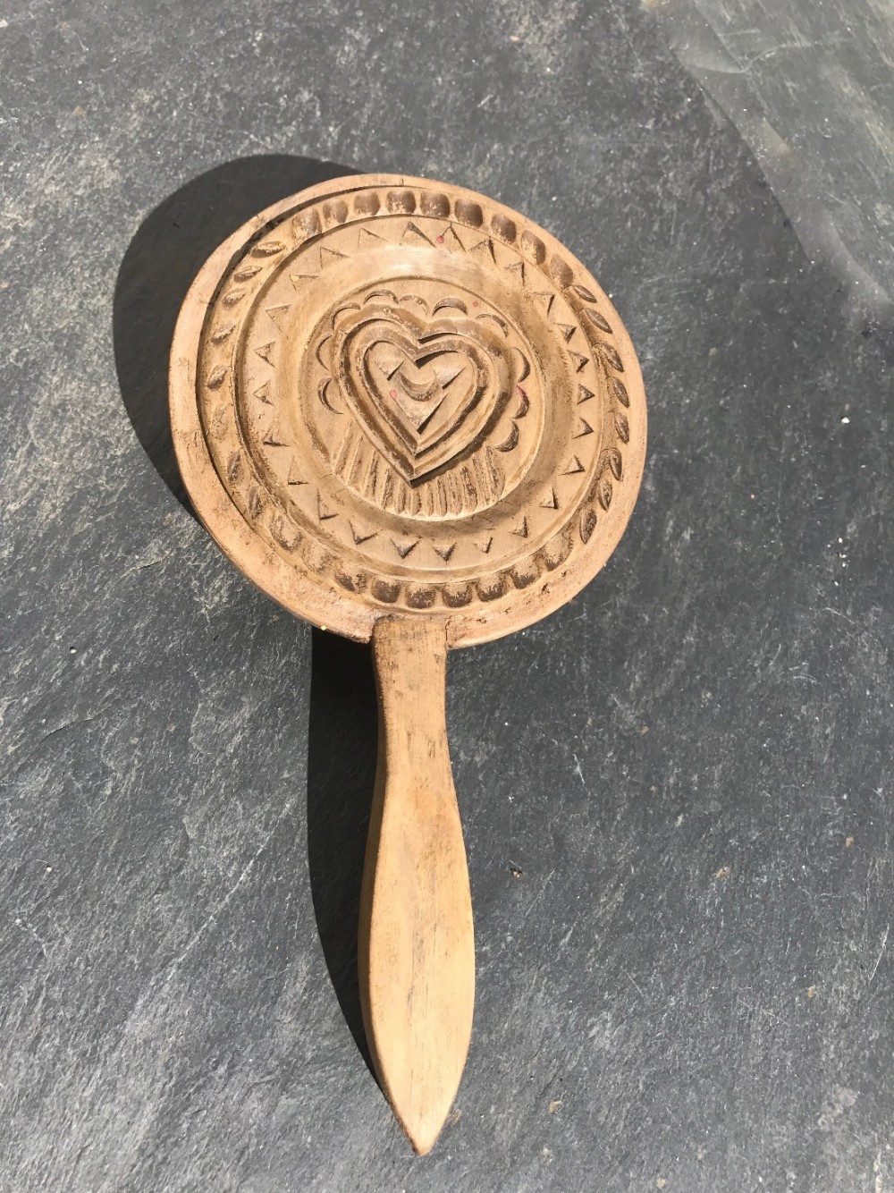 A rare sycamore butter stamp 