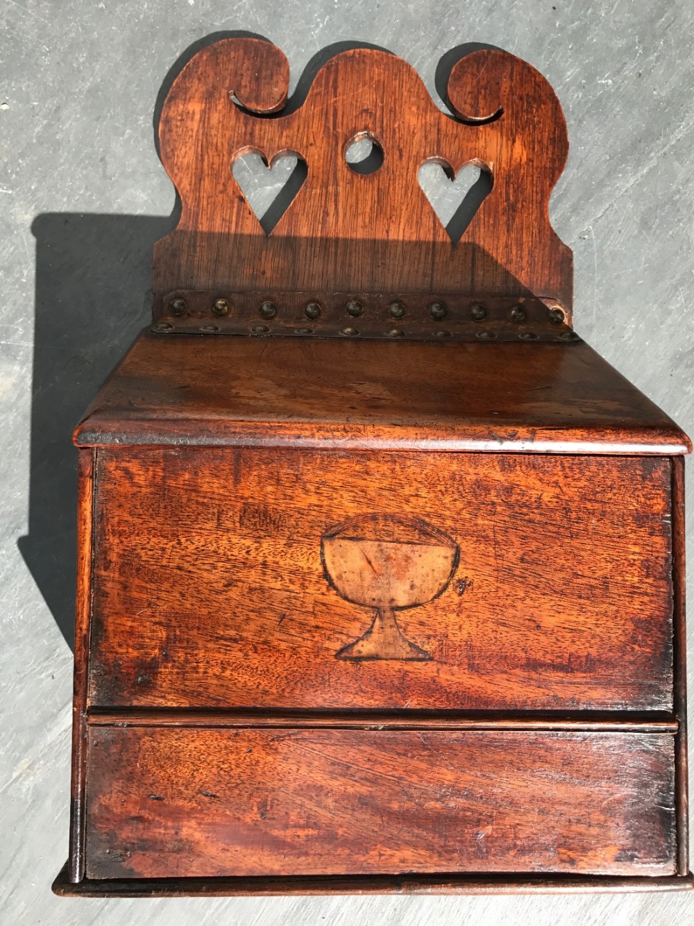 An unusual late 18th century/ early 19th century mahogany and fruit wood salt box