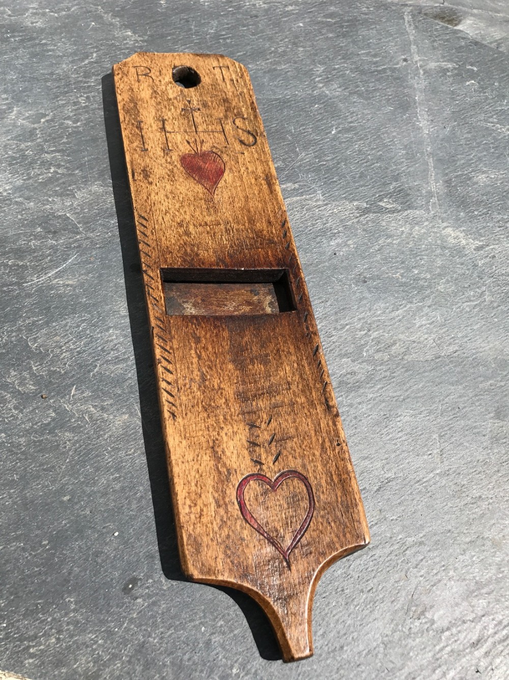 An antique 19th century Folk Art vegetable slicer