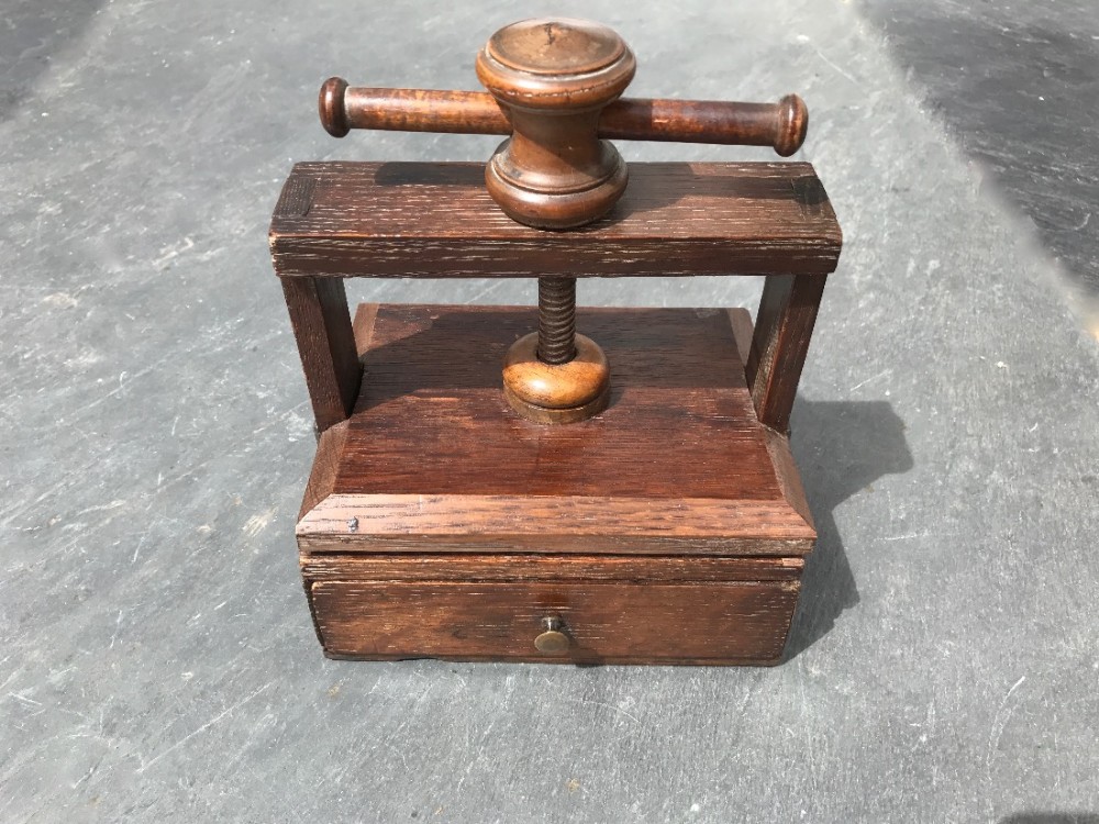A small oak Victorian press for small books, playing cards or a printing press.