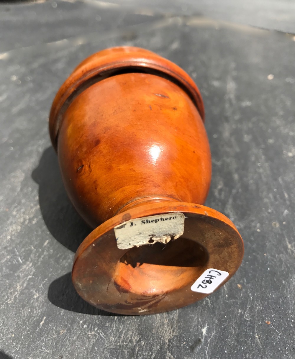 An unusual antique treen pill silverer and rounder View III