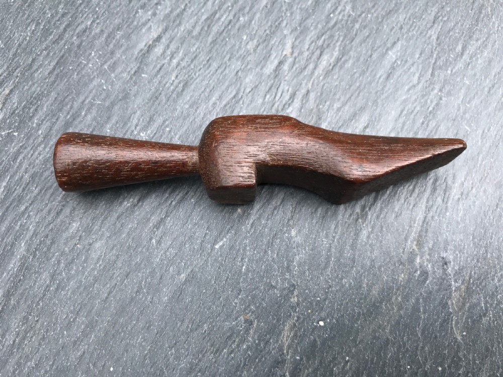 A 19th century  novelty treen pipe tamper  View III