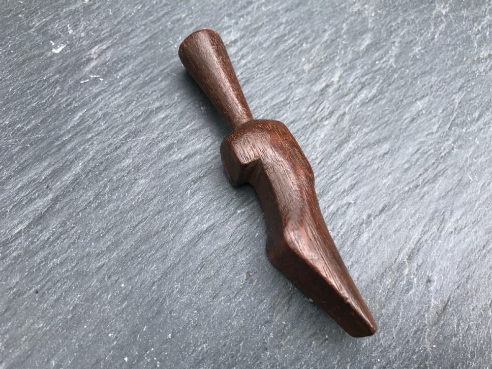 A 19th century  novelty treen pipe tamper  View IV