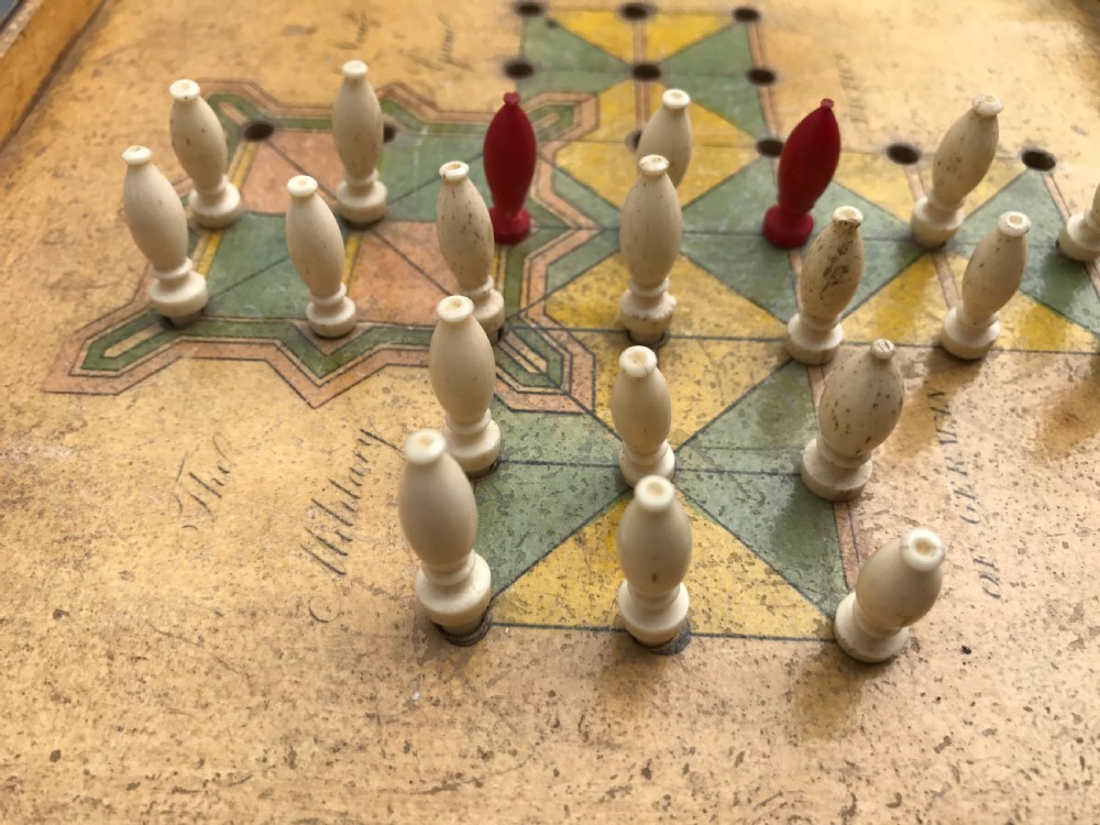 An unusual early 19th century antique white wood game - a game of inequakity