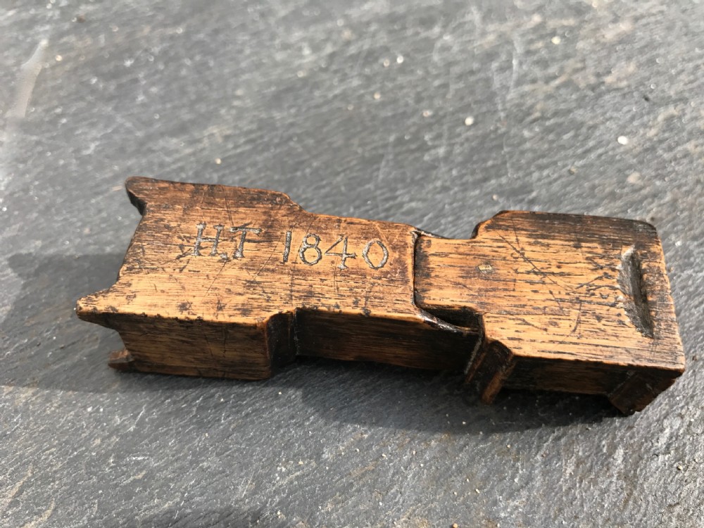 An antique snuff box in the form of a small grandfather  View III