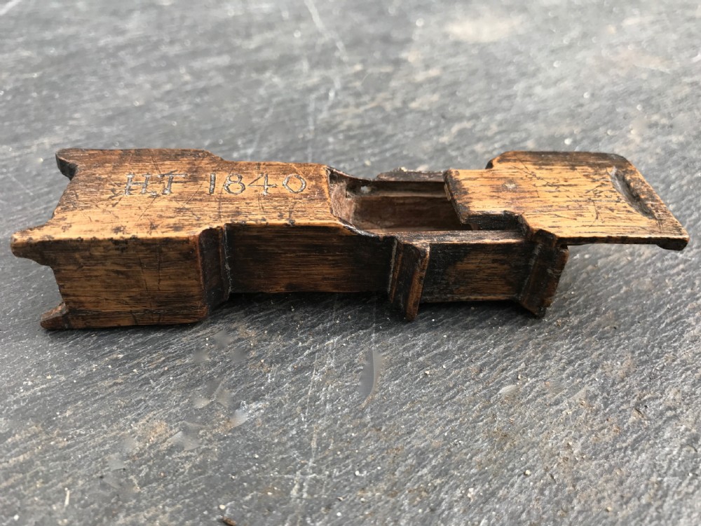 An antique snuff box in the form of a small grandfather  View IV