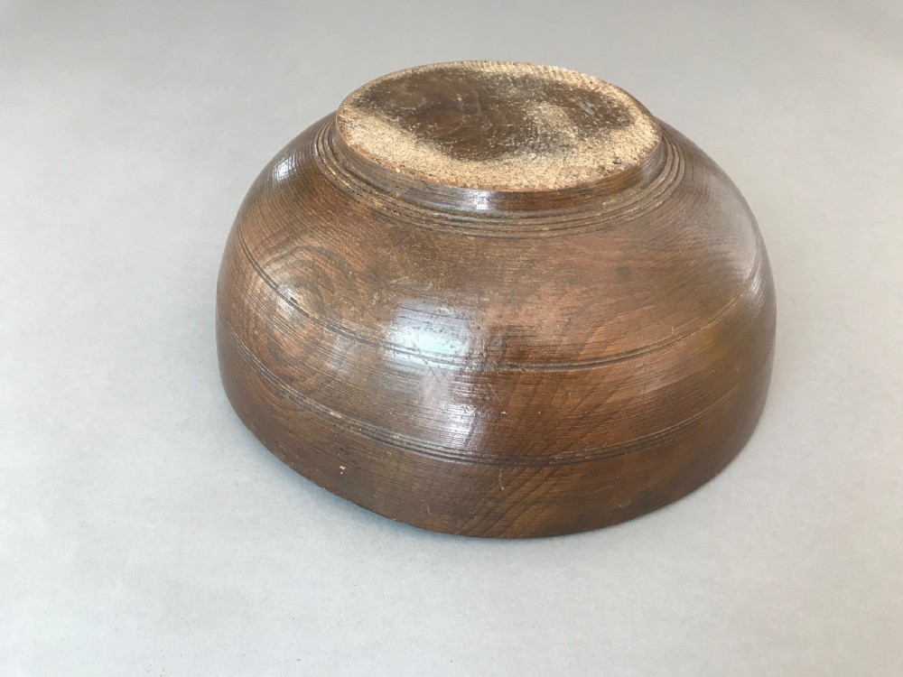 A large antique Welsh elm bowl  View III