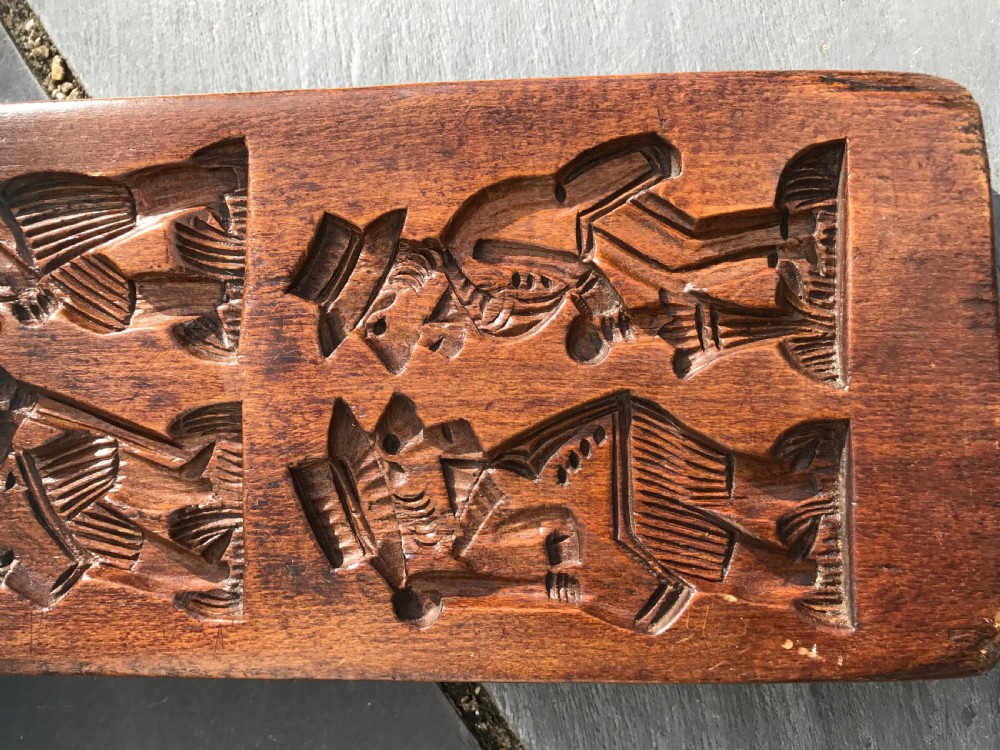 A 19th century treen carved beech wood gingerbread / biscuit mould View V