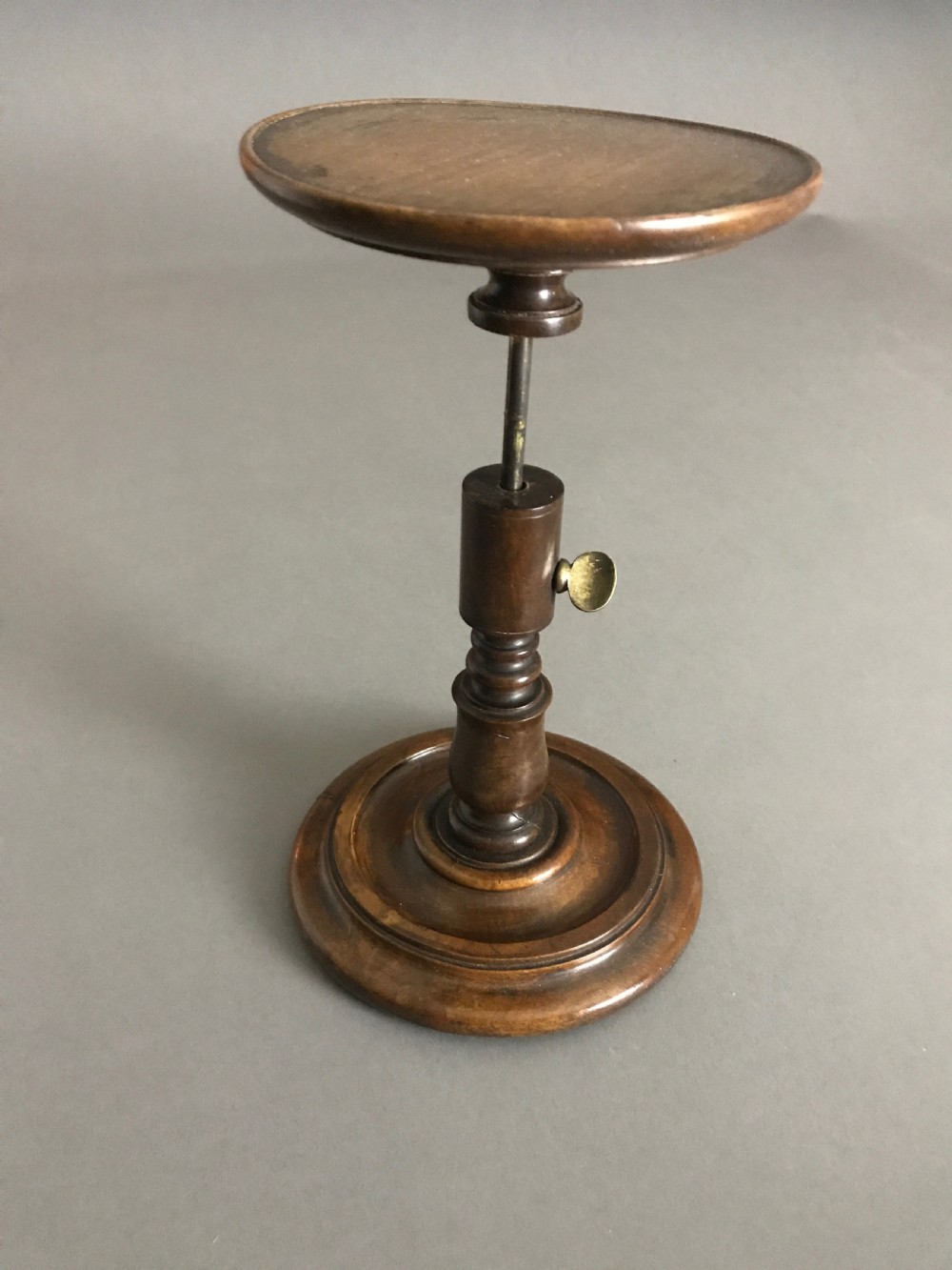 A Georgian mahogany extending candle stand 