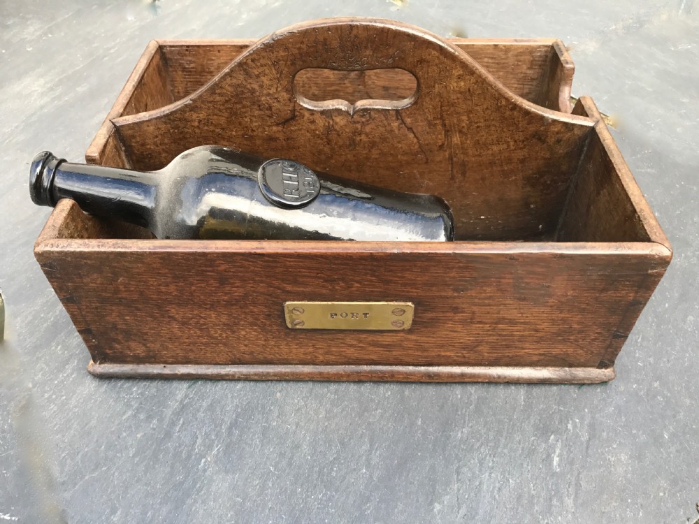 A Georgian Oak Treen Bottle Carrier