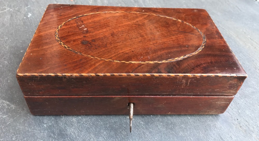 A Small Georgian Mahogany Box - unusual interior