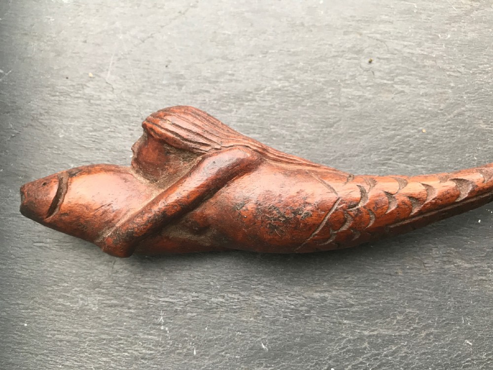 A rare shaped treen knitting sheath in the shape of a mermaid  View II