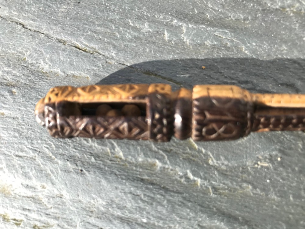 An unusual  fruitwood  lace bobbin dated 1828 - chip carved/balls/lantern View III