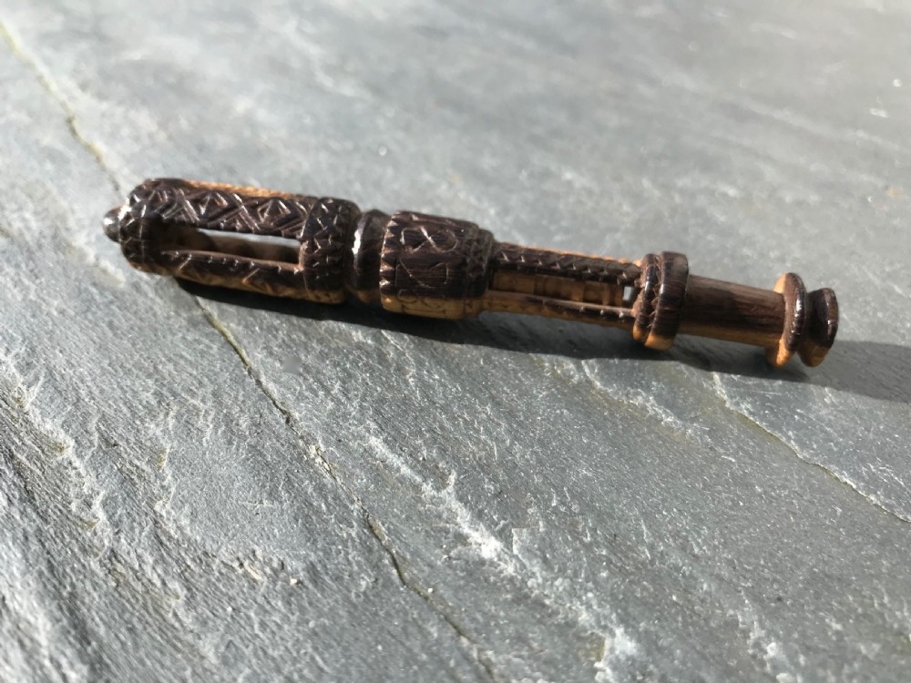 An unusual  fruitwood  lace bobbin dated 1828 - chip carved/balls/lantern View IV