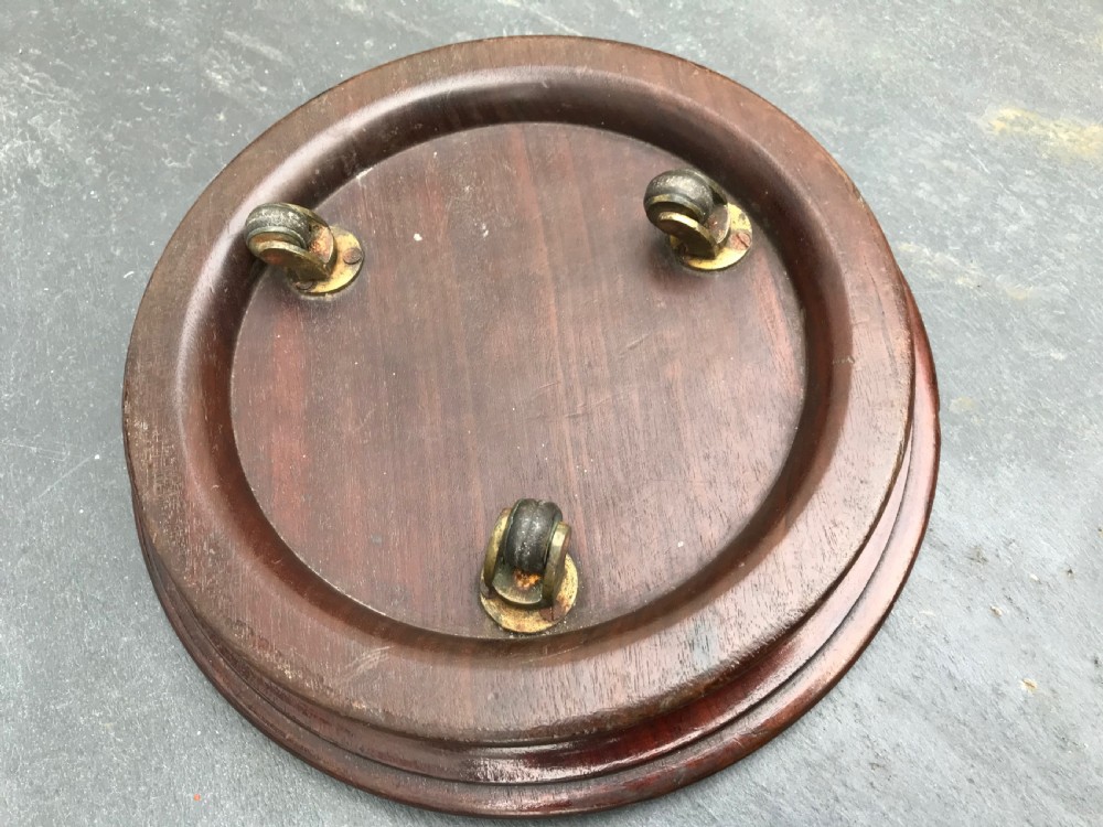 A lovely  large early 19th century mahogany coaster - on casters View III