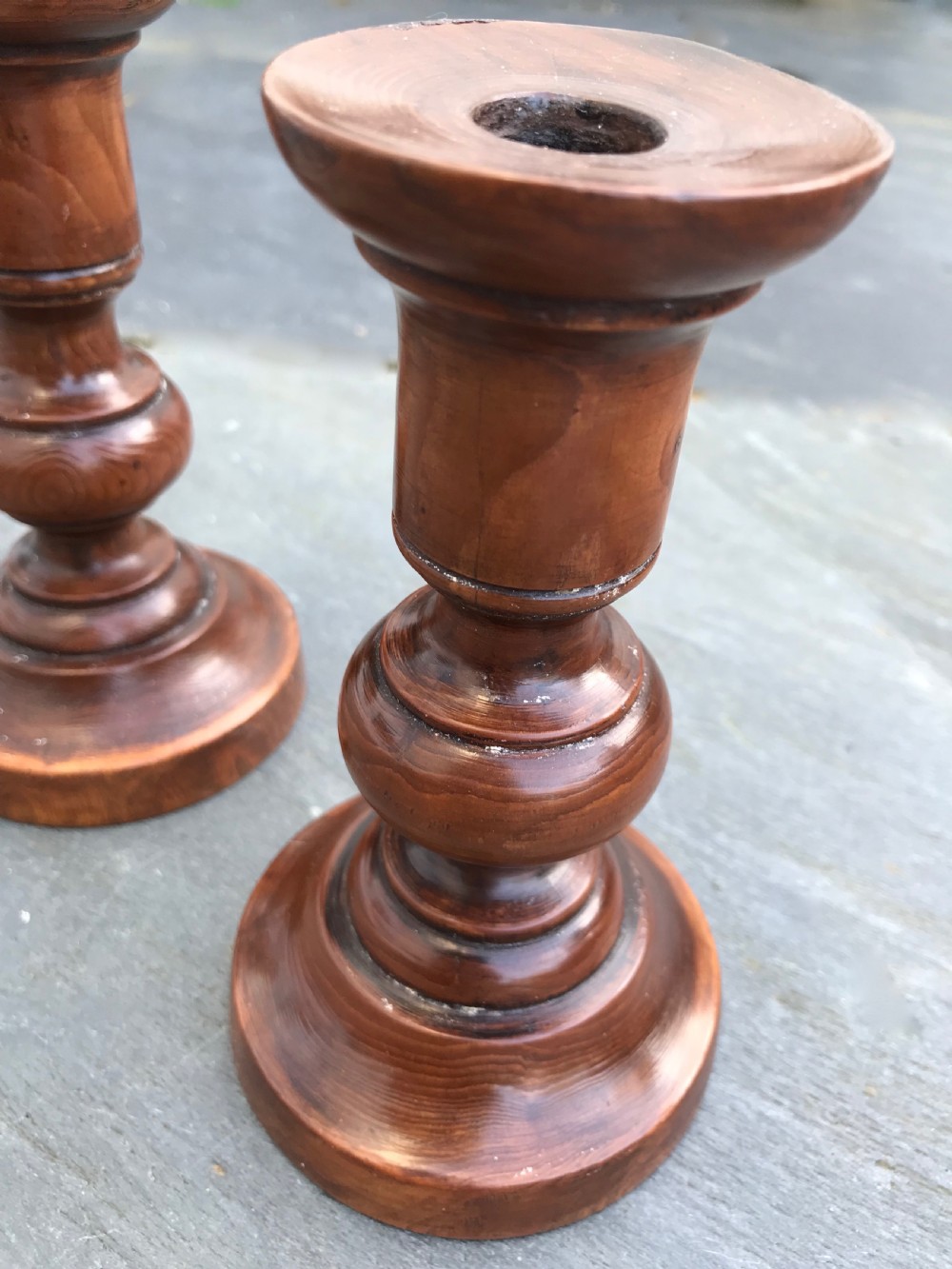A Pair of  Georgian Yew Wood Candlesticks View II